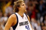 DALLAS - NOVEMBER 18:  Forward Dirk Nowitzki #41 of the Dallas Mavericks reacts after scoring in overtime against the San Antonio Spurs on November 18, 2009 at American Airlines Center in Dallas, Texas.  NOTE TO USER: User expressly acknowledges and agrees that, by downloading and/or using this Photograph, user is consenting to the terms and conditions of the Getty Images License Agreement.  (Photo by Ronald Martinez/Getty Images)