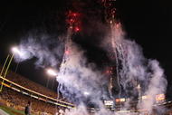 TEMPE, AZ - NOVEMBER 7:  The Arizona State Sun Devils run out onto the field as fireworks light the night sky before the college football game against the USC Trojans on November 7, 2009 at Sun Devil Stadium in Tempe, Arizona.  USC won 14-9.  (Photo by Jeff Golden/Getty Images)