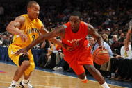 NEW YORK - NOVEMBER 19:  Scoop Jardine #11 #11of the Syracuse Orange drives to the basket against Jermone Randle #3 of the California Golden Bears during their semifinal game of the 2K Sports Classic on  November 19, 2009 at Madison Square Garden in New York City.  (Photo by Jim McIsaac/Getty Images)