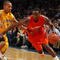 NEW YORK - NOVEMBER 19:  Scoop Jardine #11 #11of the Syracuse Orange drives to the basket against Jermone Randle #3 of the California Golden Bears during their semifinal game of the 2K Sports Classic on  November 19, 2009 at Madison Square Garden in New York City.  (Photo by Jim McIsaac/Getty Images)