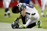 GLENDALE, AZ - NOVEMBER 15:  Wide receiver T.J. Houshmandzadeh #84 of the Seattle Seahawks looks down in the closing minutes of the game against the Arizona Cardinals at University of Phoenix Stadium on November 15, 2009 in Glendale, Arizona. The Cardinals defeated the Seahawks 31-20.  (Photo by Jeff Gross/Getty Images)