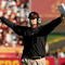 LOS ANGELES, CA - NOVEMBER 14:  Head coach Jim Harbaugh of the Stanford Cardinal signals during the game with the USC Trojans on November 14, 2009 at the Los Angeles Coliseum in Los Angeles, California.  Stanford won 55-21.  (Photo by Stephen Dunn/Getty Images)