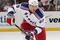 NEWARK, NJ - SEPTEMBER 16:  Evgeny Grachev #59 of the New York Rangers skates against the New Jersey Devils at the Prudential Center on September 16, 2009 in Newark, New Jersey. The Devils defeated the Rangers 3-2 in the shoot out.  (Photo by Bruce Bennett/Getty Images)