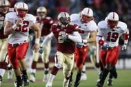 CHESTNUT HILL, MA - OCTOBER 17:  Montel Harris #2 of the Boston College Eagles breaks away from J.R. Sweezy #52 and Clem Johnson #19  of the North Carolina State Wolf Pack on October 17, 2009 at Alumni Stadium in Chestnut Hill, Massachusetts.  (Photo by Elsa/Getty Images)