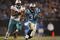 CHARLOTTE - NOVEMBER 19: DeAngelo Williams #34 of the Carolina Panthers runs the ball for a long gain in the second half against the Miami Dolphins at Bank of America Stadium on November 19, 2009 in Charlotte, North Carolina.  (Photo by Streeter Lecka/Getty Images)