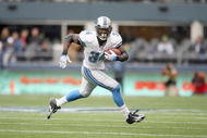 SEATTLE - NOVEMBER 08:  Kevin Smith #34 of the Detroit Lions carries the ball during the game against the Seattle Seahawks on November 8, 2009 at Qwest Field in Seattle, Washington. The Seahawks defeated the Lions 32-20. (Photo by Otto Greule Jr/Getty Images)