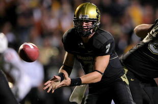 BOULDER, CO - OCTOBER 04:  Quarterback Cody Hawkins #7 of the Colorado Buffaloes runs the offense against the Texas Longhorns at Folsom Field on October 4, 2008 in Boulder, Colorado. Texas defeated Colorado 38-14.  (Photo by Doug Pensinger/Getty Images)