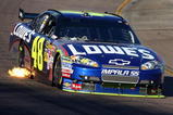 AVONDALE, AZ - NOVEMBER 15:  Jimmie Johnson, driver of the #48 Lowe's Chevrolet, races during the NASCAR Sprint Cup Series Checker O'Reilly Auto Parts 500 at Phoenix International Raceway on November 15, 2009 in Avondale, Arizona.  (Photo by Christian Petersen/Getty Images)