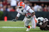 COLUMBIA, SC - NOVEMBER 14:  Brandon James #25 of the Florida Gators tries to get away from the defense of the South Carolina Gamecocks during their game at Williams-Brice Stadium on November 14, 2009 in Columbia, South Carolina.  (Photo by Streeter Lecka/Getty Images)