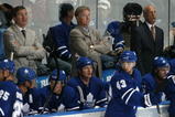 LONDON, ON - SEPTEMBER 17:  Coaches Tim Hunter, Ron Wilson and Keith Acton of the Toronto Maple Leafs concentrate on a replay on score board in a pre-season game against the Philadelphia Flyers on September 17, 2009 at the John Labatt Centre in London, Ontario. The Leafs defeated the Flyers 4-0. (Photo by Claus Andersen/Getty Images)