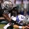 OAKLAND, CA - AUGUST 13: Defensive end Jay Richardson #98 of the Oakland Raiders sacks quarterback Jon Kitna #3 of the Dallas Cowboys after a bad snap during the preseason game at Oakland-Alameda County Coliseum on August 13, 2009 in Oakland, California. (Photo by Jed Jacobsohn/Getty Images)