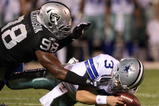 OAKLAND, CA - AUGUST 13: Defensive end Jay Richardson #98 of the Oakland Raiders sacks quarterback Jon Kitna #3 of the Dallas Cowboys after a bad snap during the preseason game at Oakland-Alameda County Coliseum on August 13, 2009 in Oakland, California. (Photo by Jed Jacobsohn/Getty Images)
