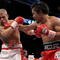 LAS VEGAS - NOVEMBER 14:  (R-L) Manny Pacquiao throws a right to the head of Miguel Cotto during their WBO welterweight title fight at the MGM Grand Garden Arena on November 14, 2009 in Las Vegas, Nevada.  (Photo by Al Bello/Getty Images)