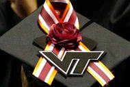BLACKSBURG, VA - MAY 11:  A Virginia Tech graduate student displays a memorial ribbon on the top of her mortarboard cap during commencement exercises for graduate students at Cassell Coliseum on the Virginia Tech campus May 11, 2007 in Blacksburg, Virginia. Less than a month after gunman Seung-Hui Cho went on his murderous rampage, killing 32 students and faculty, about 5,000 students will be honored during commencement at the school's football stadium this evening.  (Photo by Win McNamee/Getty Images)