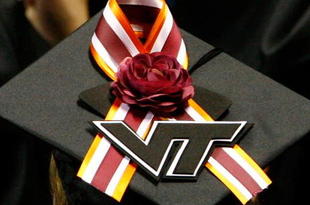BLACKSBURG, VA - MAY 11: A Virginia Tech graduate student displays a memorial ribbon on the top of her mortarboard cap during commencement exercises for graduate students at Cassell Coliseum on the Virginia Tech campus May 11, 2007 in Blacksburg, Virginia. Less than a month after gunman Seung-Hui Cho went on his murderous rampage, killing 32 students and faculty, about 5,000 students will be honored during commencement at the school's football stadium this evening. (Photo by Win McNamee/Getty Images)