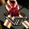 BLACKSBURG, VA - MAY 11:  A Virginia Tech graduate student displays a memorial ribbon on the top of her mortarboard cap during commencement exercises for graduate students at Cassell Coliseum on the Virginia Tech campus May 11, 2007 in Blacksburg, Virginia. Less than a month after gunman Seung-Hui Cho went on his murderous rampage, killing 32 students and faculty, about 5,000 students will be honored during commencement at the school's football stadium this evening.  (Photo by Win McNamee/Getty Images)