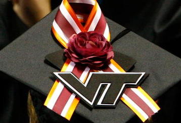 BLACKSBURG, VA - MAY 11:  A Virginia Tech graduate student displays a memorial ribbon on the top of her mortarboard cap during commencement exercises for graduate students at Cassell Coliseum on the Virginia Tech campus May 11, 2007 in Blacksburg, Virginia. Less than a month after gunman Seung-Hui Cho went on his murderous rampage, killing 32 students and faculty, about 5,000 students will be honored during commencement at the school's football stadium this evening.  (Photo by Win McNamee/Getty Images)