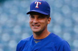 ANAHEIM, CA - SEPTEMBER 29:  Omar Vizquel #13 of the Texas Rangers looks on prior to the game against the Los Angeles Angels of Anaheim at Angel Stadium on September 29, 2009 in Anaheim, California.  (Photo by Jeff Gross/Getty Images)