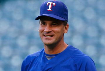 ANAHEIM, CA - SEPTEMBER 29:  Omar Vizquel #13 of the Texas Rangers looks on prior to the game against the Los Angeles Angels of Anaheim at Angel Stadium on September 29, 2009 in Anaheim, California.  (Photo by Jeff Gross/Getty Images)