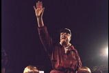 1 Jan 1996:  Head coach Bobby Bowden of the Florida State Seminoles is carried triumphantly off the field by nose guard Andre Wadsworth #8 and tackle Orpheus Roy after defeating the Notre Dame Fighting Irish in the Orange Bowl in Miami, Florida 31-26.  Ma