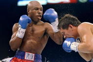 17 Sep 1994:  Julio Cesar Chavez tries to dodge a punch from Meldrick Taylor during a fight.  Chavez won the fight with an eighth round technical knockout. Mandatory Credit: Al Bello  /Allsport