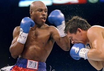 17 Sep 1994:  Julio Cesar Chavez tries to dodge a punch from Meldrick Taylor during a fight.  Chavez won the fight with an eighth round technical knockout. Mandatory Credit: Al Bello  /Allsport