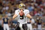 ST. LOUIS - NOVEMBER 15:  Quarterback Drew Brees #9 of the New Orleans Saints looks to pass the ball during the game against the St. Louis Rams at the Edward Jones Dome on November 15, 2009 in St. Louis, Missouri.  (Photo by Dilip Vishwanat/Getty Images)