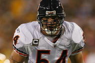 GREEN BAY, WI - SEPTEMBER 13: Brian Urlacher #54 of the Chicago Bears awaits the start of play in the 1st half against the Green Bay Packers on September 13, 2009 at Lambeau Field in Green Bay, Wisconsin. The Packers defeated the Bears 21-15. (Photo by Jonathan Daniel/Getty Images)