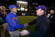 SAN DIEGO, CA - DECEMBER 23:  Head Coach Chris Petersen of the Boise State Broncos meets Heads Coach Gary Patterson of TCU Horned Frogs after the Horned Frogs 17-16 win over the Broncos during the San Diego County Credit Union Poinsettia Bowl at Qualcomm Stadium on December 23, 2008 in San Diego, California. (Photo by Donald Miralle/Getty Images)