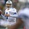 GREEN BAY, WI - NOVEMBER 15: Tony Romo #9 of the Dallas Cowboys looks at a receiver against the Green Bay Packers at Lambeau Field on November 15, 2009 in Green Bay, Wisconsin. (Photo by Jonathan Daniel/Getty Images)