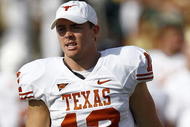 WACO, TX - NOVEMBER 14:  Quarterback Colt McCoy #12 of the Texas Longhorns ices his right hand during the fourth quarter against the Baylor Bears on November 14, 2009 at Floyd Casey Stadium in Waco, Texas.  The Longhorns beat the Bers 47-14.  (Photo by Tom Pennington/Getty Images)