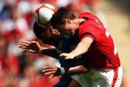 LONDON, ENGLAND - AUGUST 09:  Jonny Evans of Manchester United jumps with Didier Drogba of Chelsea  during the FA Community Shield match between Manchester United and Chelsea at Wembley Stadium on August 9, 2009 in London, England.  (Photo by Phil Cole/Getty Images)
