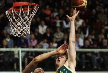 AUCKLAND, NEW ZEALAND - JUNE 26:  AJ Ogilvy of Australia is put under pressure from Alex Pledger of New Zealand during game one of the Ramsey Shield series between the New Zealand Tall Blacks and the Australian Boomers at the North Shore Events Centre on June 26, 2008 in Auckland, New Zealand.  (Photo by Phil Walter/Getty Images)
