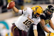 EUGENE,OR - NOVEMBER 14: Quarterback Samson Szakacsy #10 of the Arizona State Sun Devils is sacked by defensive end Terrell Turner #45 of the Oregon Ducks in the third quarter of the game at Autzen Stadium on November 14, 2009 in Eugene, Oregon. Oregon Defeated arizona State 44-21. (Photo by Steve Dykes/Getty Images)