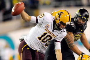 EUGENE,OR - NOVEMBER 14: Quarterback Samson Szakacsy #10 of the Arizona State Sun Devils is sacked by defensive end Terrell Turner #45 of the Oregon Ducks in the third quarter of the game at Autzen Stadium on November 14, 2009 in Eugene, Oregon. Oregon Defeated arizona State 44-21. (Photo by Steve Dykes/Getty Images)