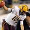 EUGENE,OR - NOVEMBER 14: Quarterback Samson Szakacsy #10 of the Arizona State Sun Devils is sacked by defensive end Terrell Turner #45 of the Oregon Ducks in the third quarter of the game at Autzen Stadium on November 14, 2009 in Eugene, Oregon. Oregon Defeated arizona State 44-21. (Photo by Steve Dykes/Getty Images)