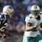 FOXBORO, MA - NOVEMBER 08:  Ronnie Brown #23 of the Miami Dolphins carries the ball as Leigh Bodden #23  of the New England Patriots defends on November 8, 2009 at Gillette Stadium in Foxboro, Massachusetts.  (Photo by Elsa/Getty Images)