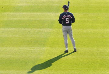 ATLANTA - APRIL 11: Coach Jim Reggleman #5 of the Washington Nationals casts a long shadow during batting practice before play against the Atlanta Braves on April 11, 2009 at Turner Field in Atlanta, Georgia.  (Photo by Al Messerschmidt/Getty Images) 