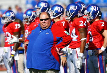 LAWRENCE, KS - SEPTEMBER 26:  Head coach Mark Mangino of the Kansas Jayhawks watches during warm-ups just prior to the start of the game against the Southern Mississippi Golden Eagles on September 26, 2009 at Memorial Stadium in Lawrence, Kansas.  (Photo by Jamie Squire/Getty Images)