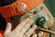 17 Dec 1995: Browns Fan Jim Vourliotis, of Parma Heights, Ohio, wipes tears from his eye through the dog mask he was wearing before the start of the Cleveland Browns v Cincinnati Bengals game at Cleveland Stadium stadium in Cleveland, Ohio. This was the B