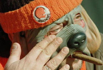 17 Dec 1995: Browns Fan Jim Vourliotis, of Parma Heights, Ohio, wipes tears from his eye through the dog mask he was wearing before the start of the Cleveland Browns v Cincinnati Bengals game at Cleveland Stadium stadium in Cleveland, Ohio. This was the B