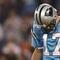 CHARLOTTE - NOVEMBER 19: Jake Delhomme #17 of the Carolina Panthers stabds on the field with his head down against the Miami Dolphins at Bank of America Stadium on November 19, 2009 in Charlotte, North Carolina.  (Photo by Streeter Lecka/Getty Images)