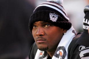 OAKLAND, CA - NOVEMBER 15:  JaMarcus Russell #2 of the Oakland Raiders sits on the bench after being taken out of their game against the Kansas City Chiefs at Oakland-Alameda County Coliseum on November 15, 2009 in Oakland, California.  (Photo by Ezra Shaw/Getty Images)