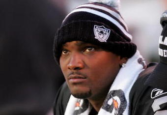 OAKLAND, CA - NOVEMBER 15:  JaMarcus Russell #2 of the Oakland Raiders sits on the bench after being taken out of their game against the Kansas City Chiefs at Oakland-Alameda County Coliseum on November 15, 2009 in Oakland, California.  (Photo by Ezra Shaw/Getty Images)