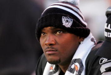 OAKLAND, CA - NOVEMBER 15:  JaMarcus Russell #2 of the Oakland Raiders sits on the bench after being taken out of their game against the Kansas City Chiefs at Oakland-Alameda County Coliseum on November 15, 2009 in Oakland, California.  (Photo by Ezra Shaw/Getty Images)