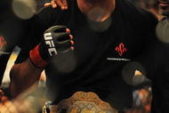 LAS VEGAS - JULY 11:  Georges St. Pierre celebrates his victory against Thiago Alves during their welterweight title bout during UFC 100 on July 11, 2009 in Las Vegas, Nevada. St. Pierre defeated Alves by unanimous decision.  (Photo by Jon Kopaloff/Getty Images)