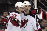 PITTSBURGH, PA - NOVEMBER 12:  Niclas Bergfors #18 of the New Jersey Devils celebrates his goal with Mark Fraser #2 in the second period at Mellon Arena against the Pittsburgh Penguins on November 12, 2009 in Pittsburgh, Pennsylvania.(Photo by Justin K. Aller/Getty Images)