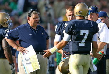 SOUTH BEND, IN - SEPTEMBER 19: Head coach Charlie Weis of the Notre Dame Fighting Irish talks with quarterback Jimmy Clausen #7 during a game against the Michigan State Spartans on September 19, 2009 at Notre Dame Stadium in South Bend, Indiana. (Photo by Jonathan Daniel/Getty Images)