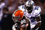 CLEVELAND - AUGUST 22:  Steve Heiden #82 of the Cleveland Browns falls forward as he is hit by Anthony Henry #32 of the Detroit Lions during the first quarter of their NFL game in Cleveland Browns Stadium on August 22, 2009 in Cleveland, Ohio.  (Photo by Matt Sullivan/Getty Images)