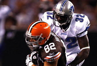 CLEVELAND - AUGUST 22:  Steve Heiden #82 of the Cleveland Browns falls forward as he is hit by Anthony Henry #32 of the Detroit Lions during the first quarter of their NFL game in Cleveland Browns Stadium on August 22, 2009 in Cleveland, Ohio.  (Photo by Matt Sullivan/Getty Images)